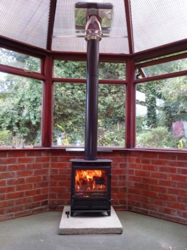 wood burner in a conservatory